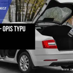 Biały liftback z otwartym bagażnikiem, w którym widać fioletową walizkę. #PORADNIK