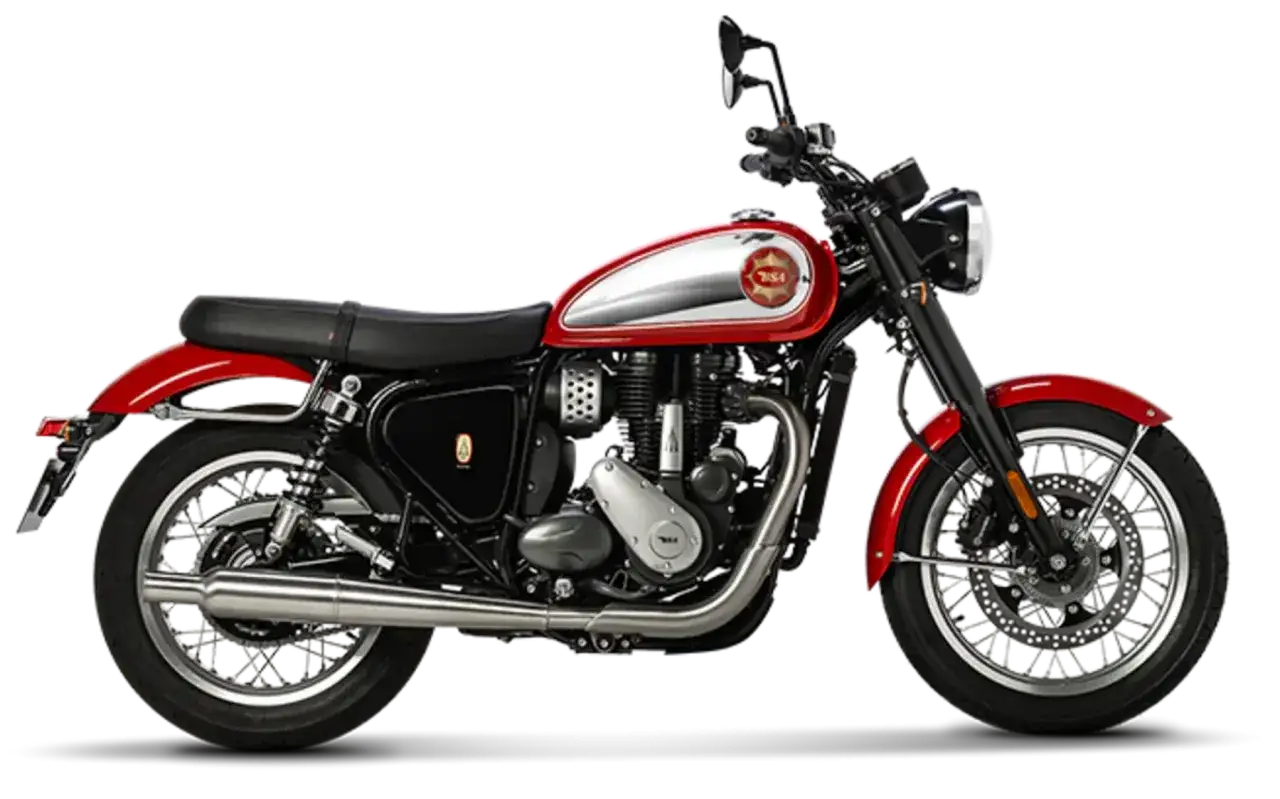 Klasyczny motocykl BSA w kolorze czerwono-srebrnym, z chromowanym wydechem i szprychowymi kołami. Idealny na weekendowe wypady.