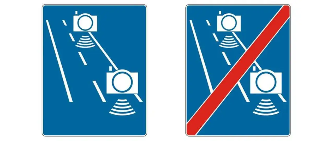 Znaki drogowe informujące o odcinkowym pomiarze prędkości. Jeden oznacza początek, drugi koniec strefy.